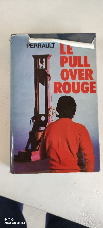 Le pull over rouge | Gilles perrault