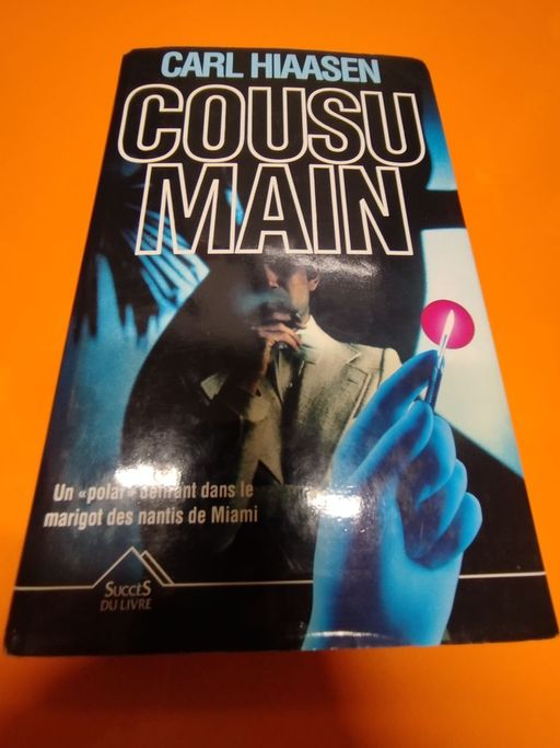 Cousu Main  | carl Hiaasen 